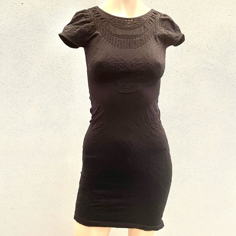 Bebe black short sleeve Bodycon dress with laser cut pattern